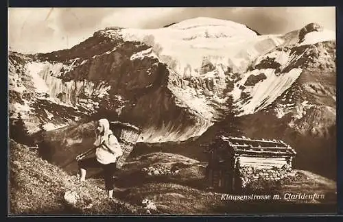 AK Klausenstrasse, Junger Bergbauer vor Hütte gegen Claridenfirn