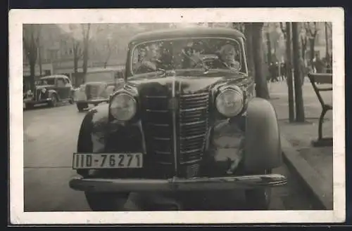 Foto-AK Opel Kadett K38, Familie Fuch im Auto, 1939