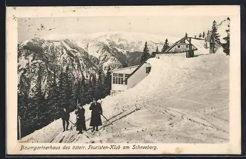 AK Baumgartnerhaus, Skiläufer vor der Berghütte