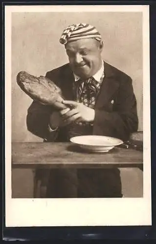 AK Ein Mann bei Tisch mit Haxe