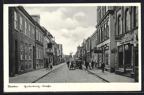 AK Norden / Nordsee, Hindenburg-Strasse mit Geschäften