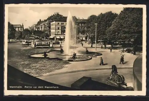 AK Mannheim, Partie vor dem Wasserturm mit Strassenbahn