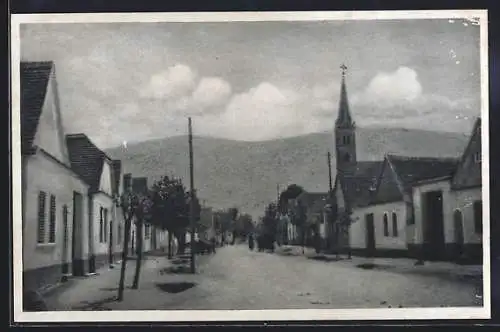 AK Unterpullendorf, Strasse mit Blick zur Kirche