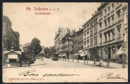 AK St. Johann a. d. S., Reichsstrasse mit Geschäften