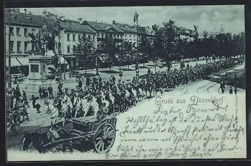 Mondschein-AK Düsseldorf, Militärparade vor Denkmal und Buchhandlung