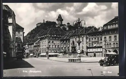 AK Graz, der  Platz mit Denkmal und Uhrenturm, Cafe Nordstern