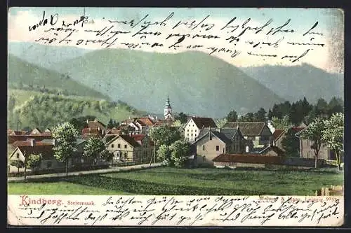 AK Kindberg /Steiermark, Ortspanorama mit Strasse und Bergen