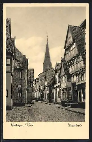 AK Nienburg a. d. Weser, Weserstrasse mit Blick zur Kirche