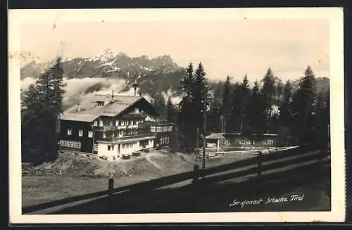 AK Schwaz, Gasthaus Grafenast mit den Bergen