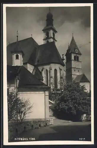 AK Kitzbühel /Tirol, Ortspartie an der Kirche