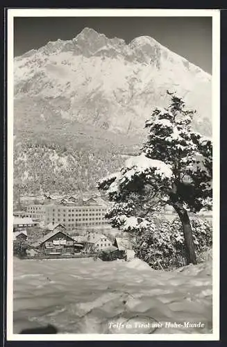 AK Telfs in Tirol, Ortsansicht mit Hohe-Munde im Winter
