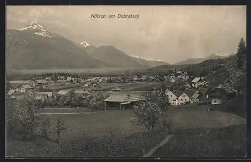 AK Nötsch am Dobratsch, Ortsansicht mit Bergpanorama