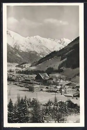 AK St. Anton a. Arlberg, Verschneite Ortsansicht vom Berg aus