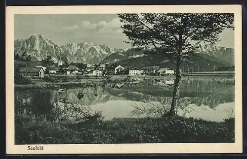 AK Seefeld, Ortsansicht mit Bergpanorama vom Wasser aus