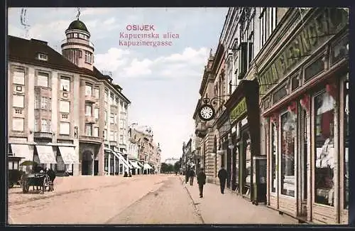 AK Osijek, Kapuzinergasse, Strassenpartie mit Geschäften