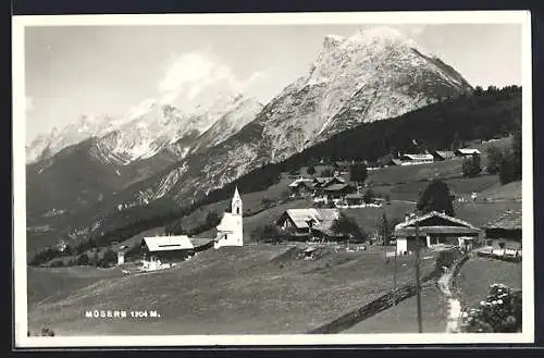 AK Mösern, Ortsansicht in der Berglandschaft