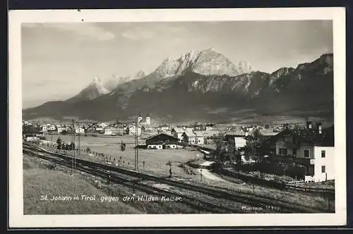 AK St. Johann, Ortsansicht gegen den Wilden Kaiser