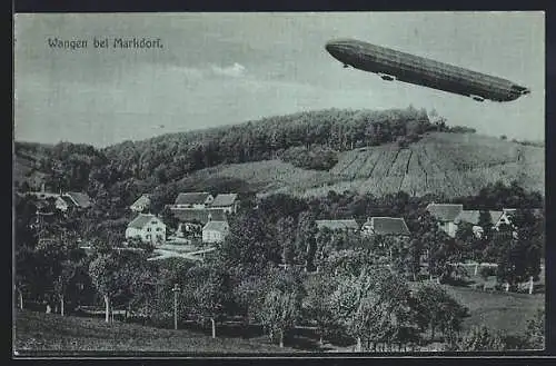 Mondschein-AK Wangen / Allgäu, Ortsansicht mit fliegendem Zeppelin Luftschiff