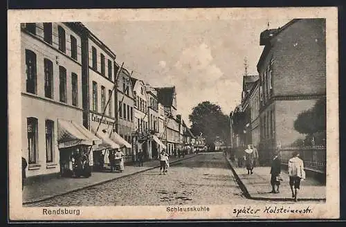 AK Rendsburg, Strassenpartie an der Schleusskuhle mit Colonialwarengeschäft