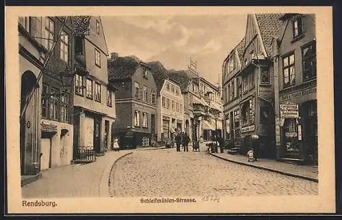 AK Rendsburg, Schleifmühlen-Strasse mit Buchhandlung von Carl Herberg