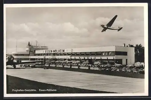 AK Essen-Mülheim, Flughafen-Gaststätte, Inh. Gebrüder Schulten, Flugzeug im Flug, Bauhaus