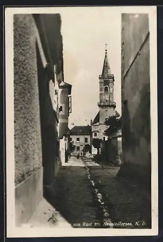 AK Rust, Strassenpartie mit Kirche