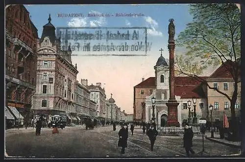 AK Budapest, Rácóczistrasse mit Denkmal und Passanten, Strassenbahn