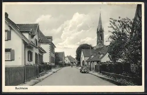 AK Buchheim, Strassenpartie mit parkendem Auto, Kirche