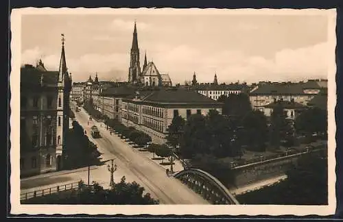 AK Olmütz, Bahnhofstrasse mit Strassenbahn