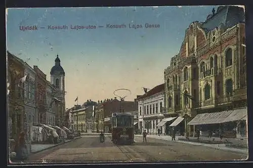 AK Ujvidek, Kossuth Lajos Gasse mit Strassenbahn