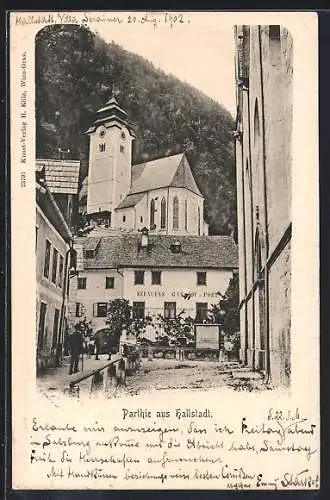 AK Hallstatt, Strassenpartie mit Aeeauers Gasthof Post und Kirche