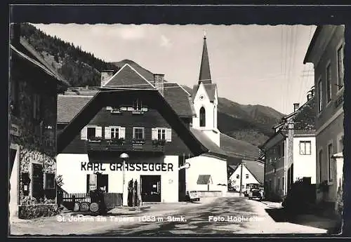 AK St. Johann am Tauern, Strassenpartie mit Blick auf den Kirchturm