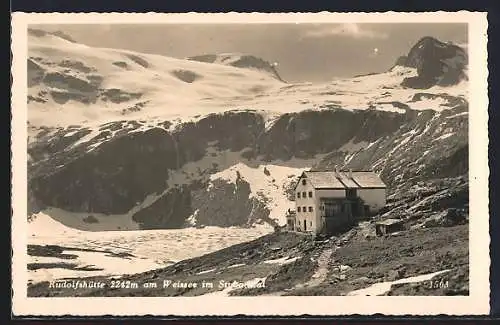 AK Rudolfshütte am Weissee, Berghütte mit gefrorenem See