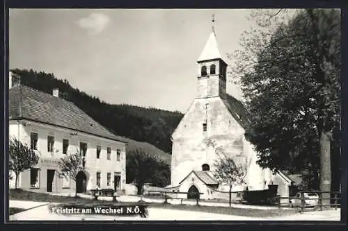 AK Feistritz am Wechsel, Ortspartie mit Kaufhaus Spreitzgrabner und Kirche