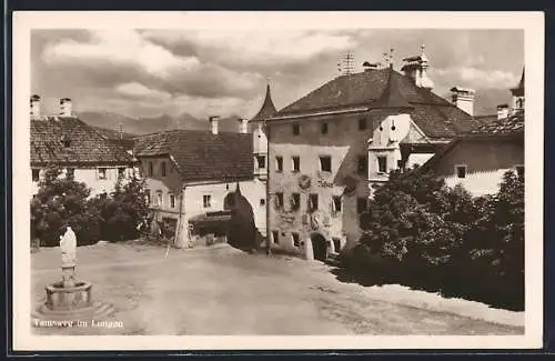 AK Tamsweg, Strassenpartie mit Brunnen