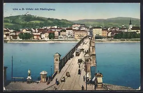 AK Linz /Donau, Strassenbahn auf der Brücke, Urfahr mit Pöstlingberg