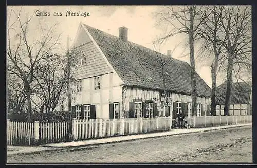 AK Menslage, Gasthaus, Mann mit zwei Hunden