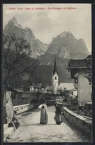 AK Seis a. Schlern, Dorfstrasse mit Schlern, Kirche