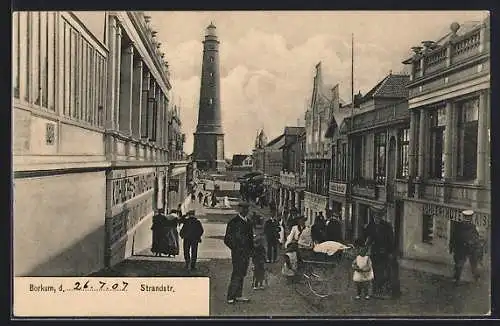 AK Borkum, Strandstrasse mit Geschäften und Leuchtturm