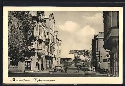 AK Nordenham, Hafenstrasse mit Blick zum Kran