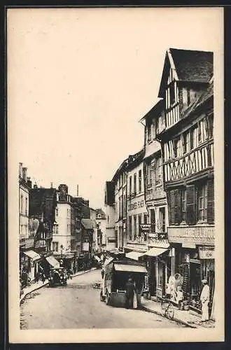 AK Lisieux, La Grande-Rue animée avec boutiques et passants