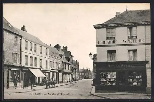 AK Livarot, La Rue de Vimoutiers avec librairie et papeterie