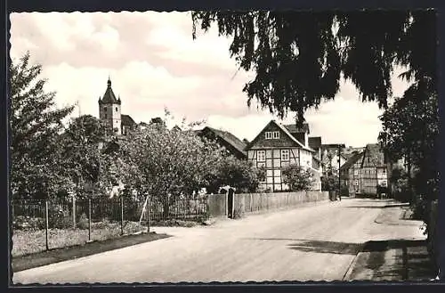 AK Besse /Bez. Kassel, Gudensberger Strasse mit Kirche