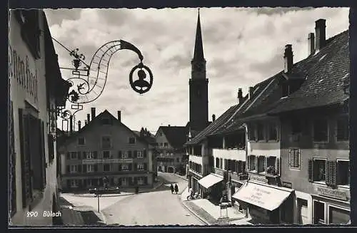 AK Bülach, Strassenpartie mit Bäckerei und Metzgerei J. Surber