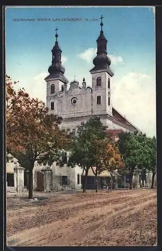 AK Maria Lanzendorf, Strassenpartie mit Kirche