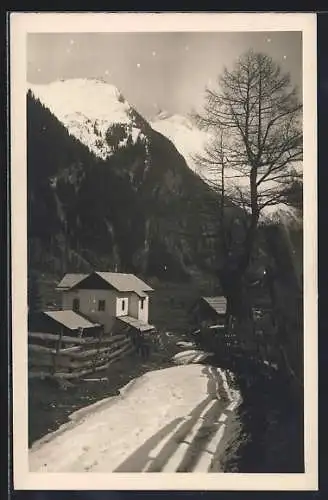 AK Mallnitz /Kärnten, Gasthof Alpenrose mit Strasse im Winter