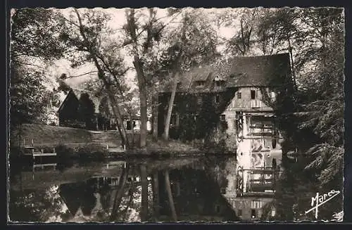 AK Andé, Le Moulin pittoresque sur la rivière entouré d`arbres