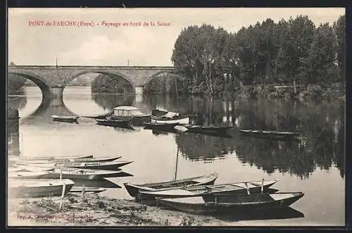 AK Pont-de-l`Arche, Paysage au bord de la Seine avec bateaux et pont en arrière-plan