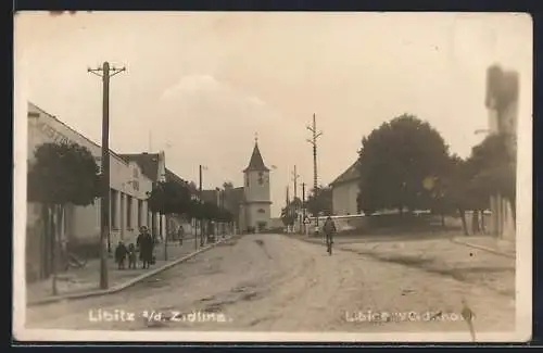 AK Libitz a. d. Zidlina, Strassenpartie mit Blick zur Kirche