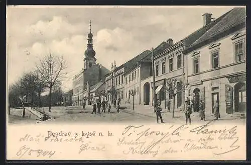 AK Lysá n. L., Strassenpartie mit Geschäften und Kirche